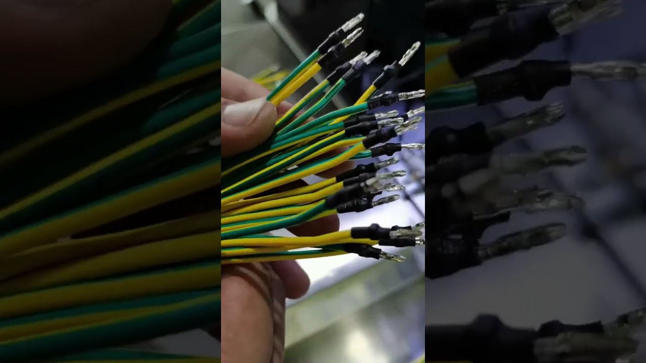 Inserting Heat Shrink Tube onto Crimped Wires and #machine #cablewirestrippingmachine #factory